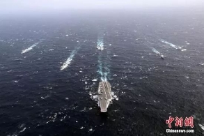 早新闻：国防部回应在南海扩大军事部署