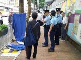 香港食环署与警署联手清除法轮功邪教违法宣传品（组图）