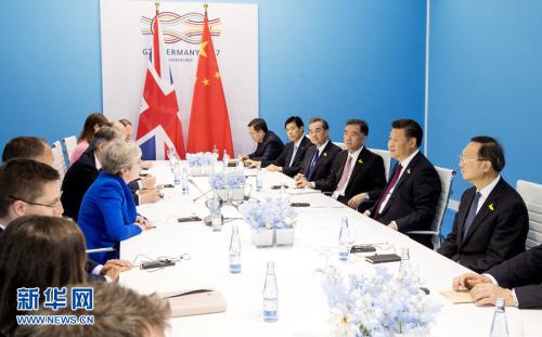 资料图：2017年7月7日，中国国家主席习近平在汉堡会见英国首相特雷莎·梅。 新华社记者 李学仁 摄 图片来源：新华网