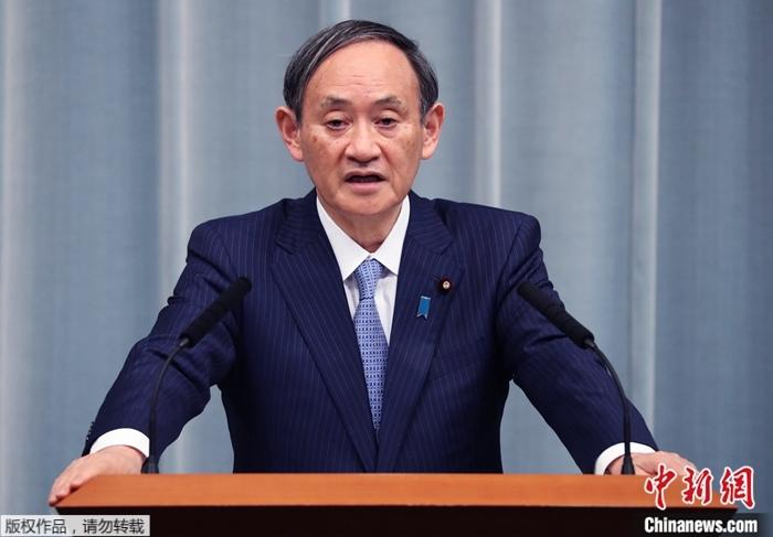 资料图为日本内阁官房长官菅义伟。 点击进入下一页