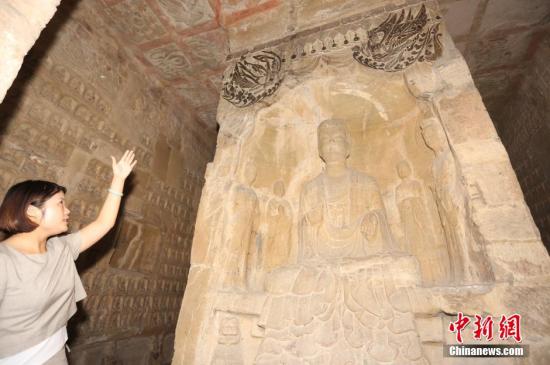 资料图:石窟寺内容丰富的造像雕刻。杨正华 摄 点击进入下一页