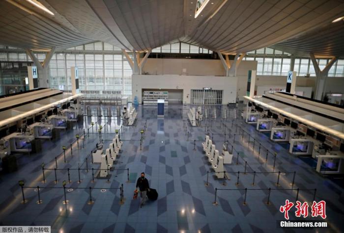 资料图:疫情下的东京国际机场。 点击进入下一页