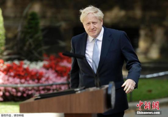 资料图:英国首相约翰逊。 点击进入下一页