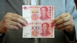 新版100元人民币发行 4招可分辨真假钞