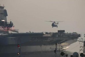 国产航母海试新动向！直升机甲板起降测试