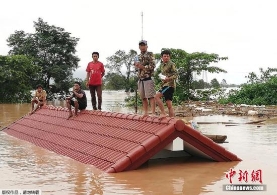老挝南部一水电站溃坝致20人死上百人失踪