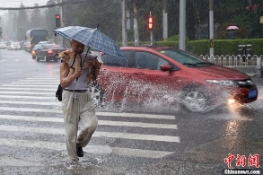 北京首发暴雨橙色预警 3000人出动