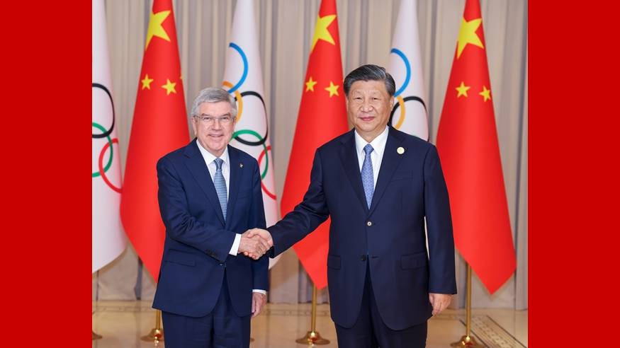 习近平会见国际奥林匹克委员会主席巴赫