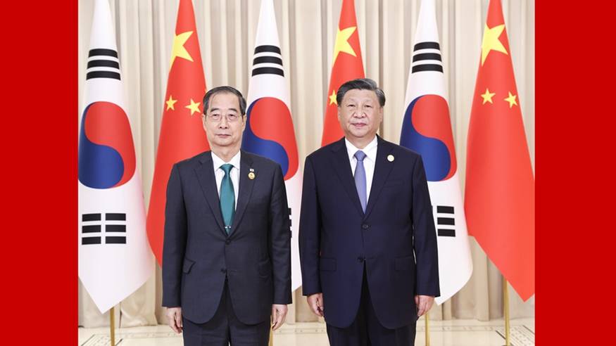 习近平会见韩国总理韩德洙