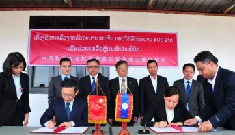 中国援助老挝执法车辆交接仪式在万象举行