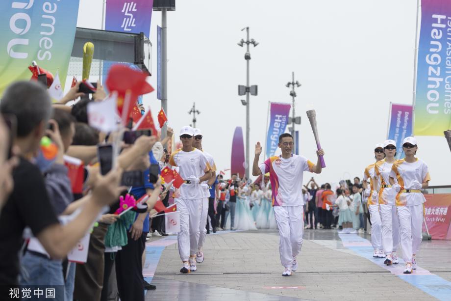 [图]杭州亚运会火炬传递回杭州