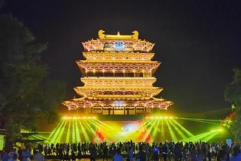 光影加持下的鹳雀楼遇上国家级非遗“绛州鼓乐”