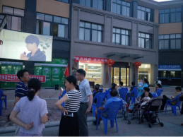 江西浮梁县送电影进社区宣传反邪教