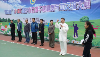新乡市借百城千村健身气功交流大赛开展反邪教宣传（图）