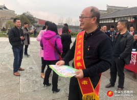 江西抚州：120名志愿者走进文昌里景区开展反邪教宣传